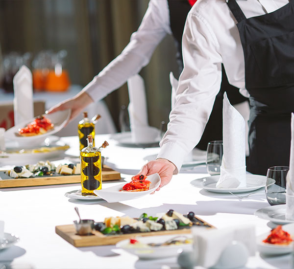 Restaurent waiters serving
